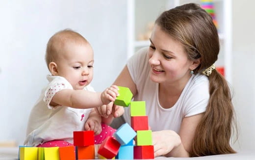 a person holding a baby