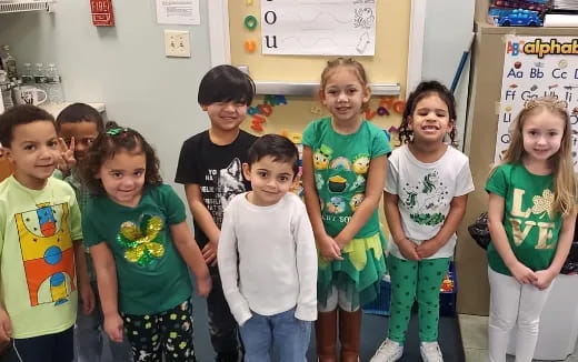 a group of children posing for a photo