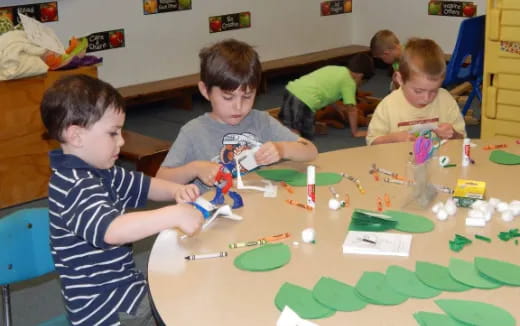 a group of children playing with toys