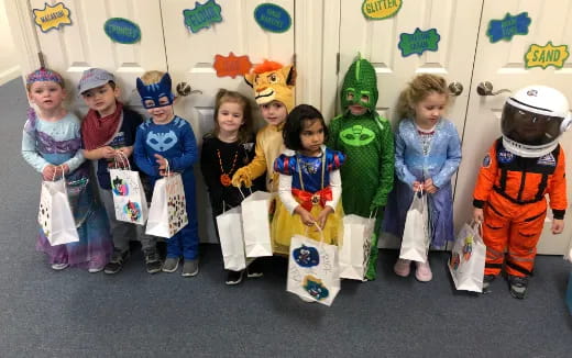 a group of children in clothing