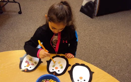 a child painting on paper