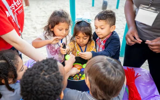 a group of children eating