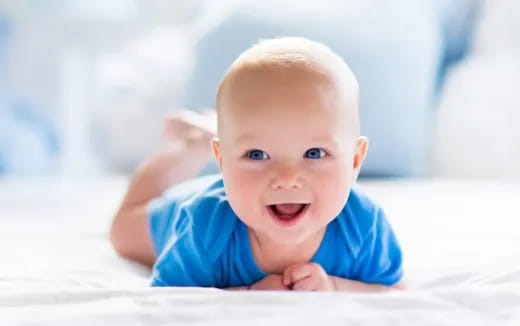 a baby lying on its back