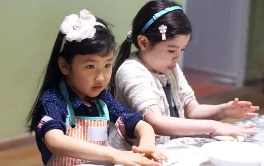 medium shot of kids wearing matching outfits
