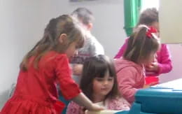 a group of children in a classroom