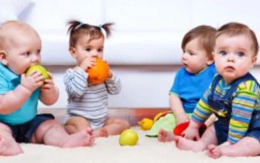 a group of children playing with toys