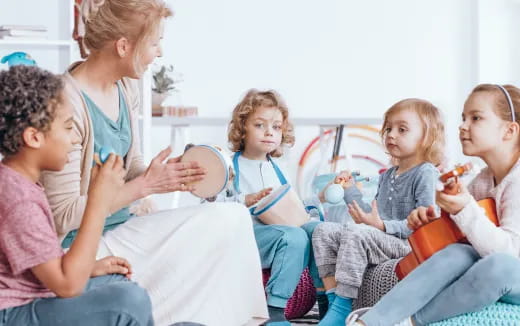 a group of children sitting on a couch
