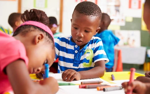 a few children in a classroom