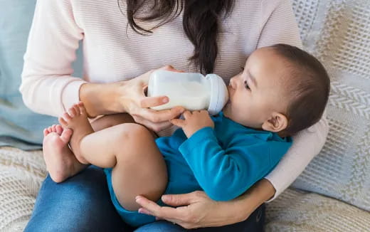 a person holding a baby