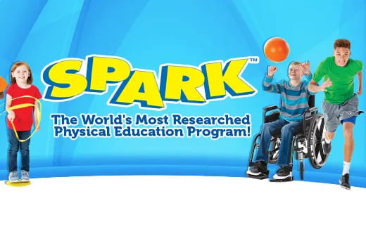 a group of people playing basketball