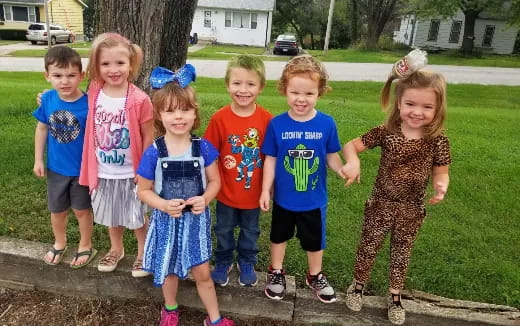 a group of children posing for a photo