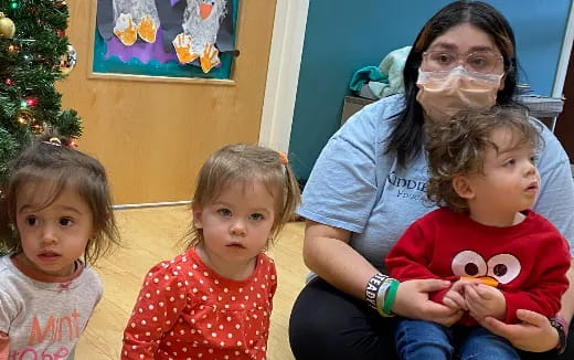 a person and several children