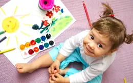 a girl sitting on the floor