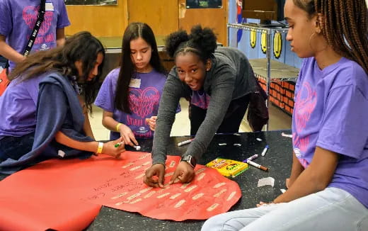 a group of women painting