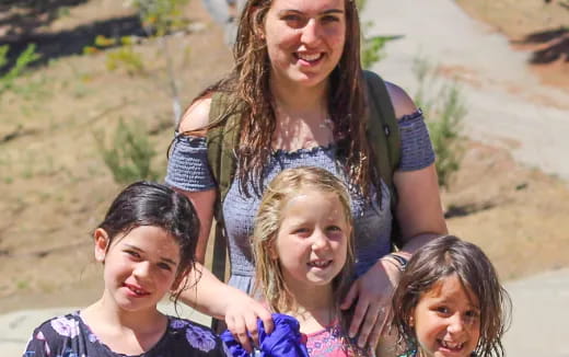 a group of people posing for the camera