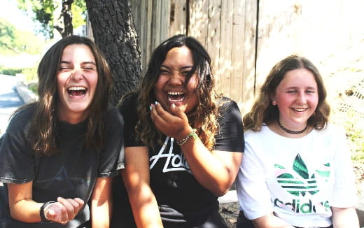 a group of women laughing