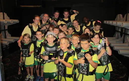 a group of children wearing matching uniforms