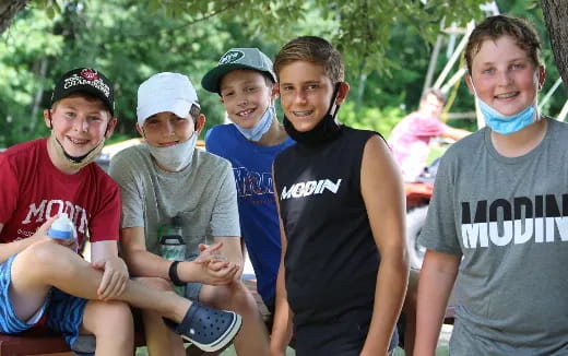 a group of people posing for a photo