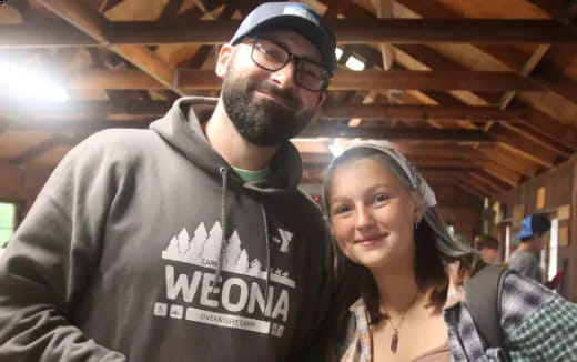 a man and woman posing for a picture