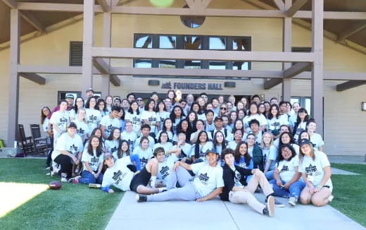 a group of people posing for a photo