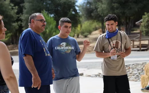 a group of people standing outside