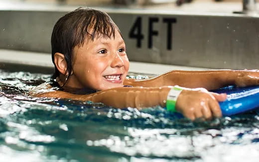 a child in a pool