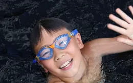 a boy with a stethoscope around his neck