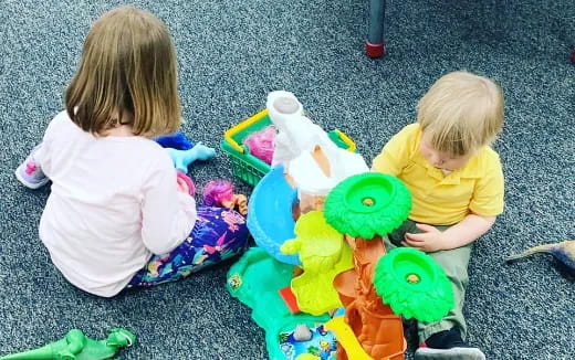 two children playing with toys