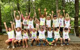 a group of children posing for a photo