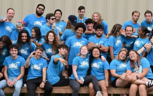 a group of people posing for a photo