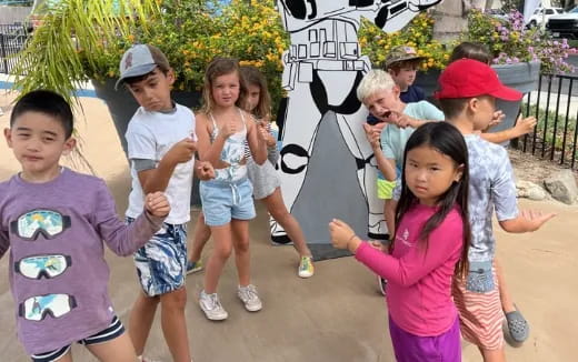 a group of children posing for a photo