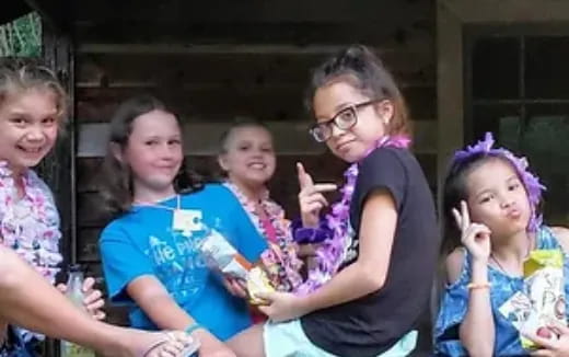 a group of girls posing for a photo
