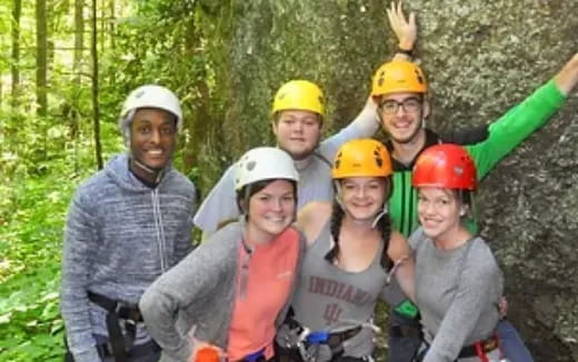 a group of people wearing helmets