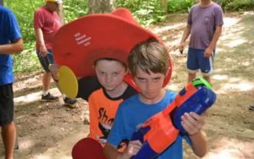 a couple of boys playing with toys