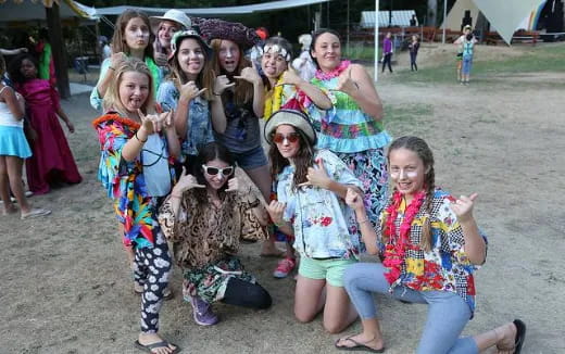 a group of people posing for a photo