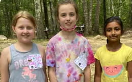 a group of girls smiling