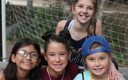 a group of people posing for the camera