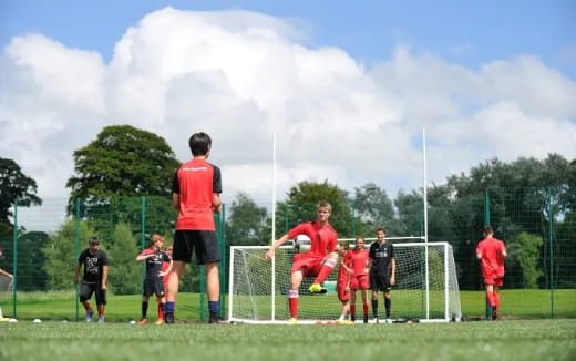 a group of men playing football