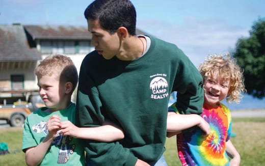 a man holding a child