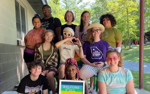 a group of people posing for a photo