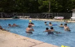 a group of people in a pool
