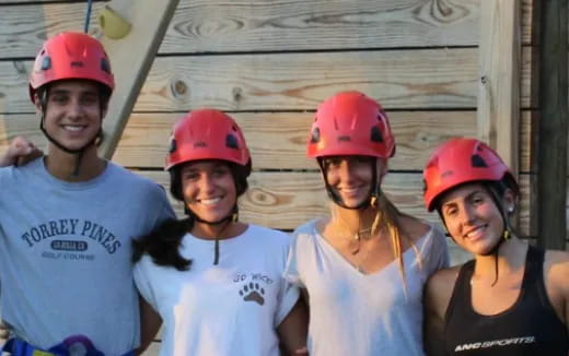 a group of people wearing helmets