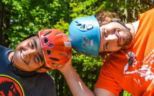a group of men wearing helmets
