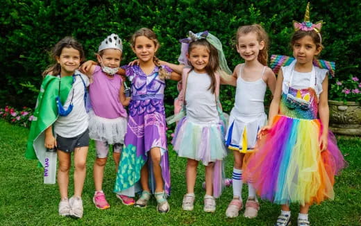 a group of girls posing for a photo