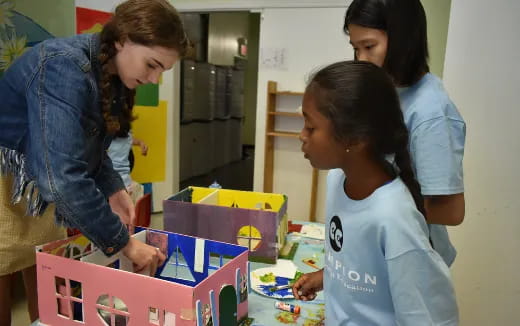 a group of people playing with toys