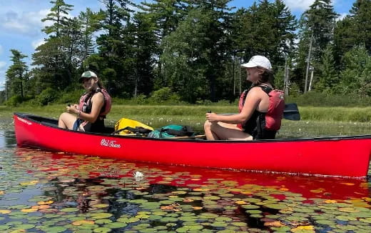 two women in a canoe