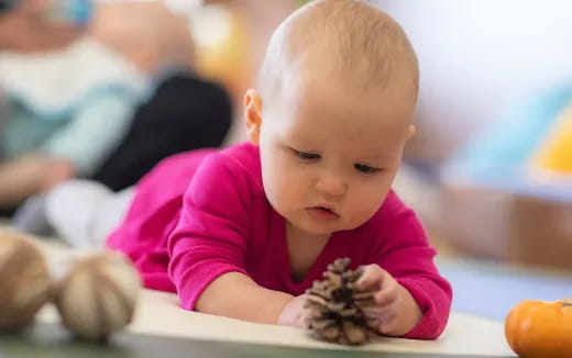 a baby crawling on a table