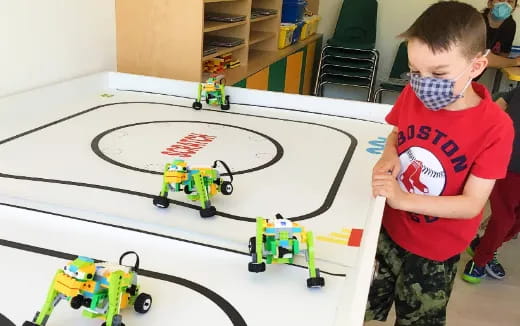 a boy playing with toys