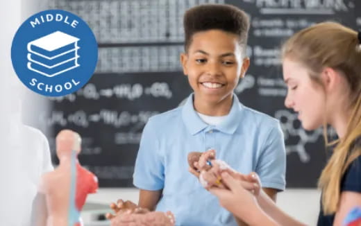 a boy smiling and clapping