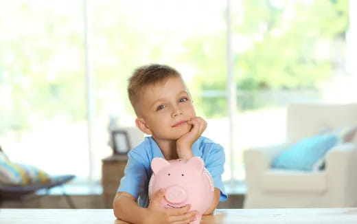 a child holding a toy